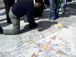 An activist draws a compass rose